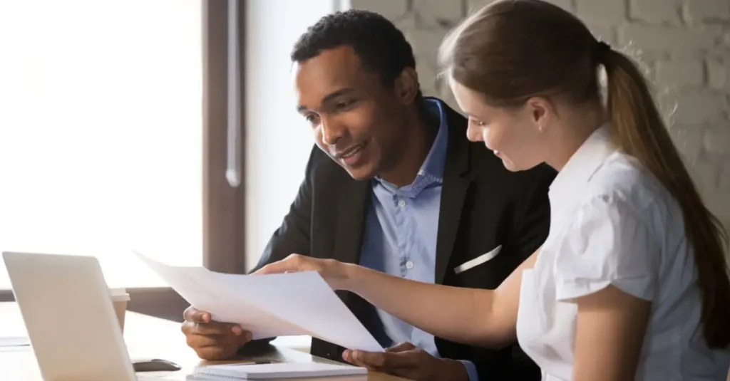 A man and woman discussing employment law changes