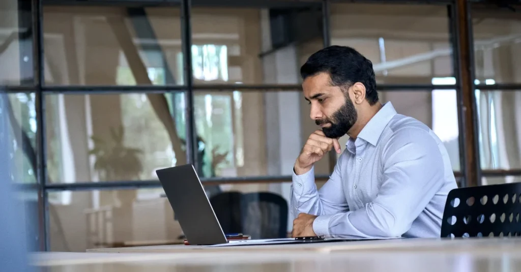 Employee watching a webinar on ethnicity data disclosure requirements.