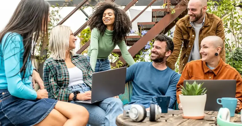 Employee enjoying a great employee experience because their employer has good pay transparency, benefits and other practices.
