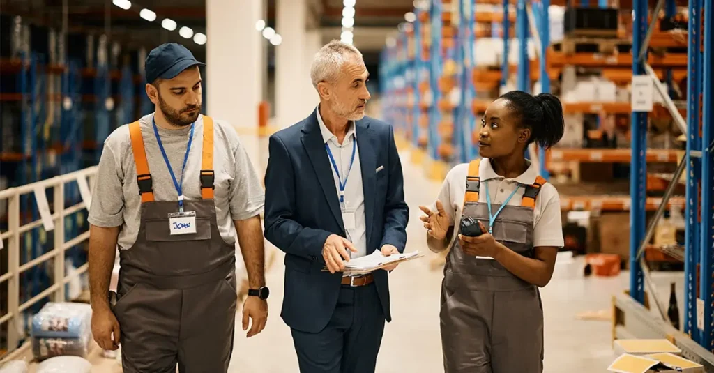 Employees discussing recruitment and reskililng with an HR leader.