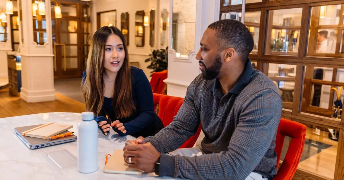 HR manager checking in with employee on their wellbeing