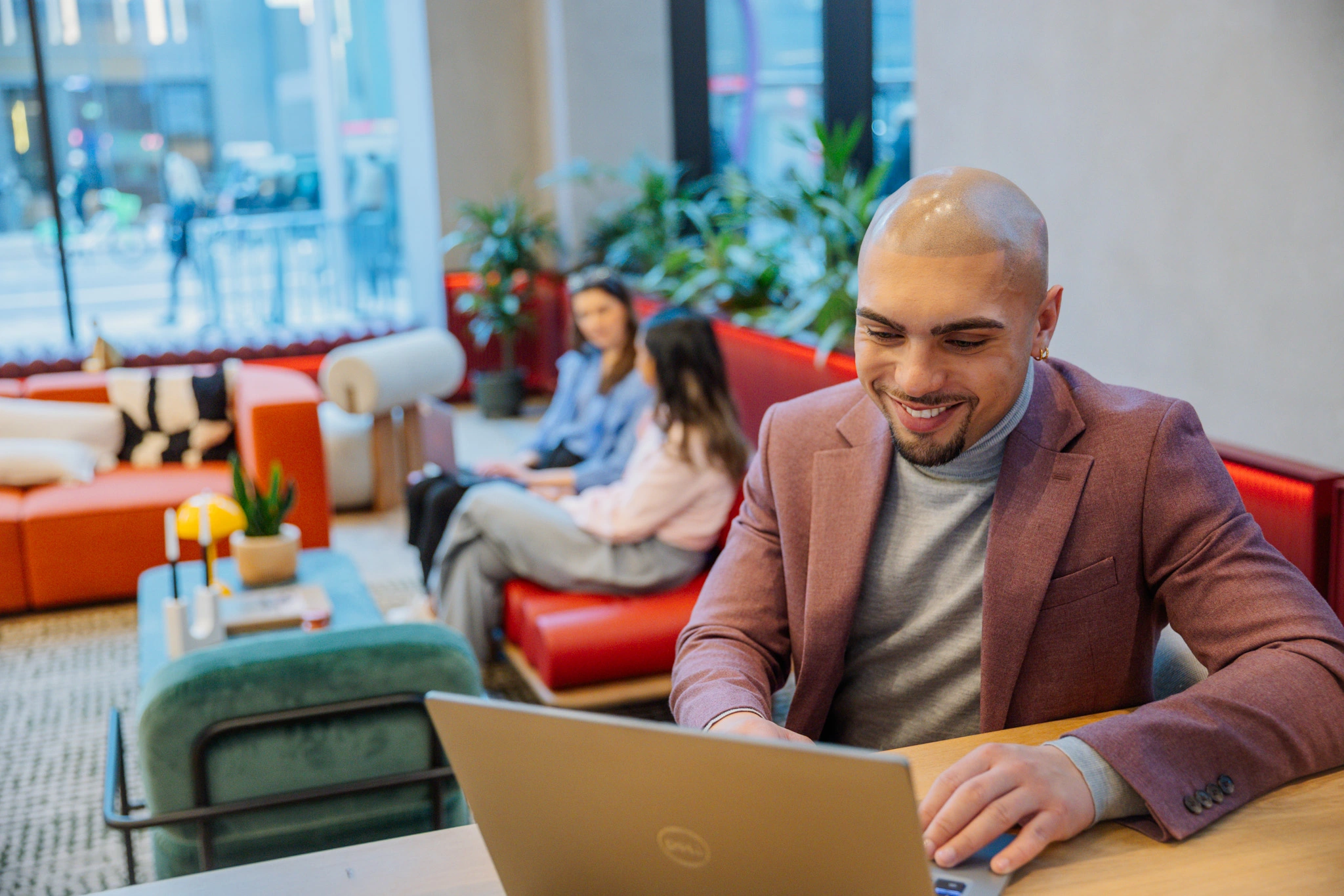 colleagues smiling and discussing probation period updates