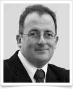 Darren Newman headshot, black and white