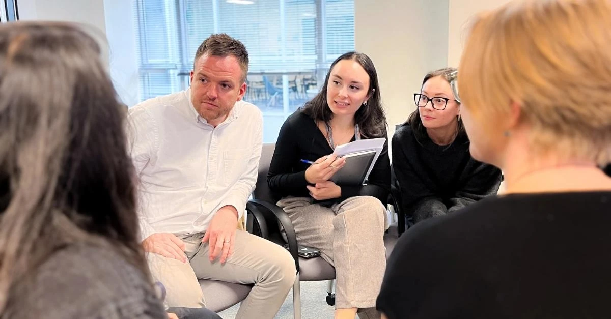 HR colleagues in a group discussion