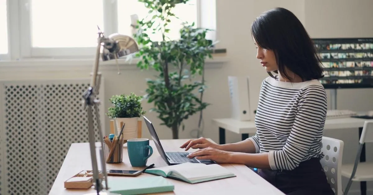 HR manager working on a laptop