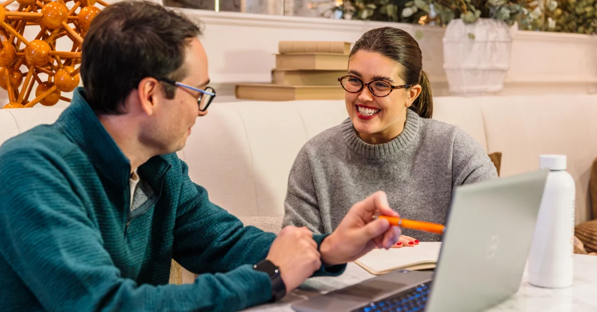 Colleagues discussing the Brightmine HR Scholarship 2025.