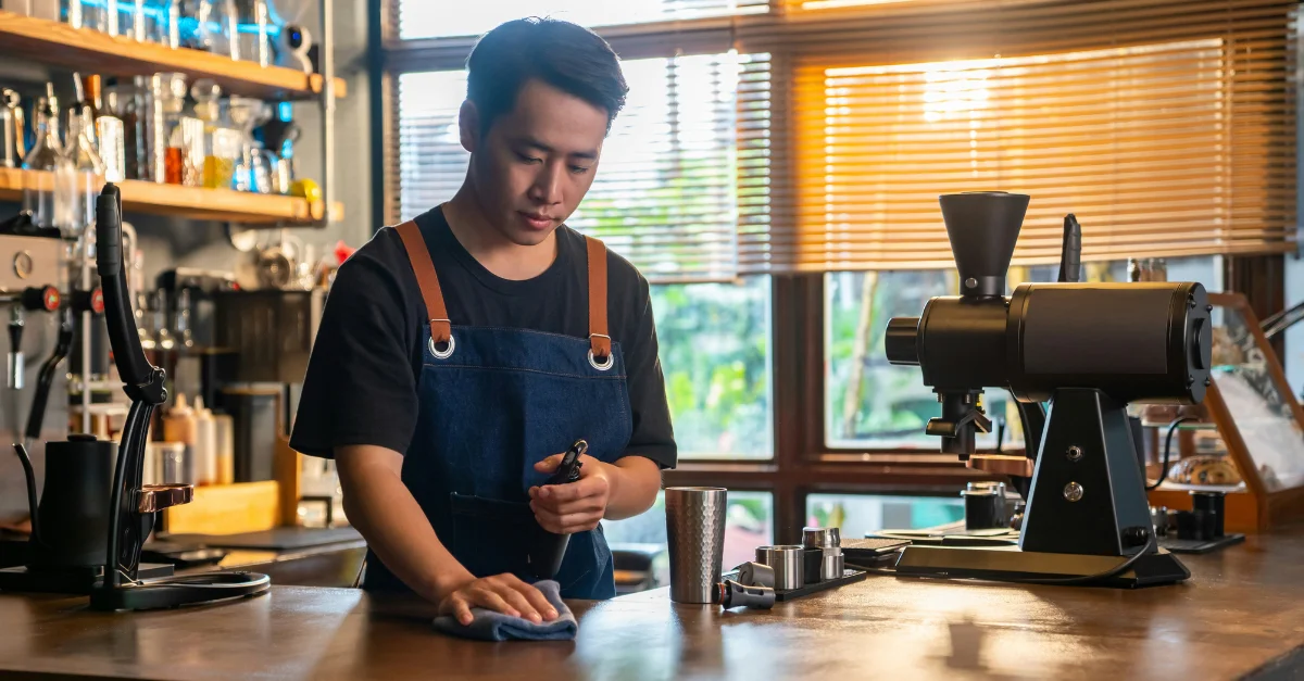 Tipped employee working in a coffee shop.