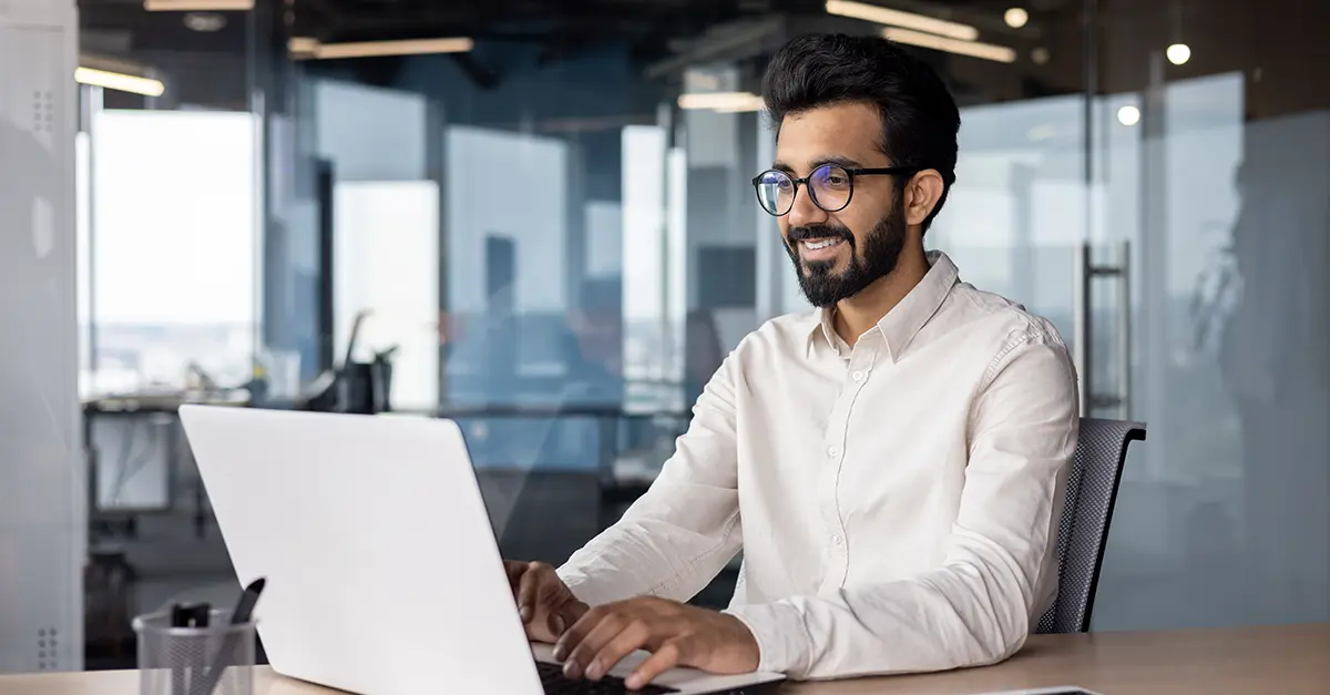 Office worker working on his laptop v2