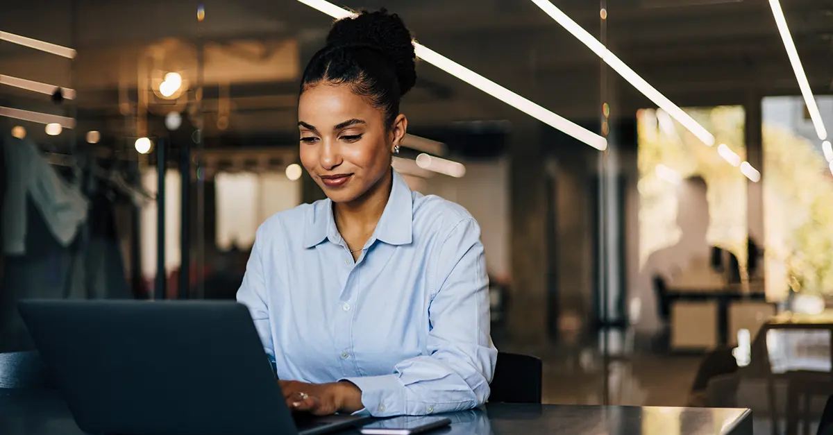 Brightmine office worker drafting email
