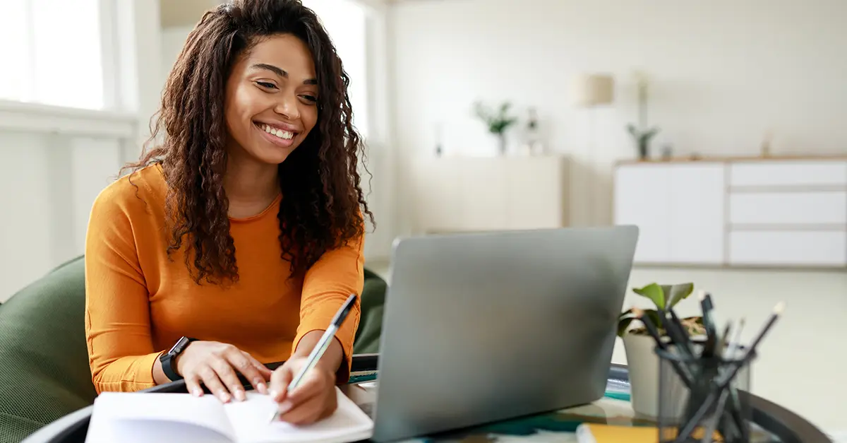 Brightmine office worker taking notes