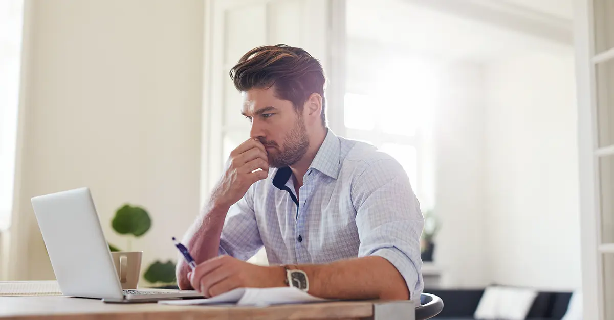 Brightmine-office worker using his laptop v2