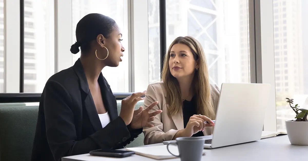 Brightmine-office colleagues meeting