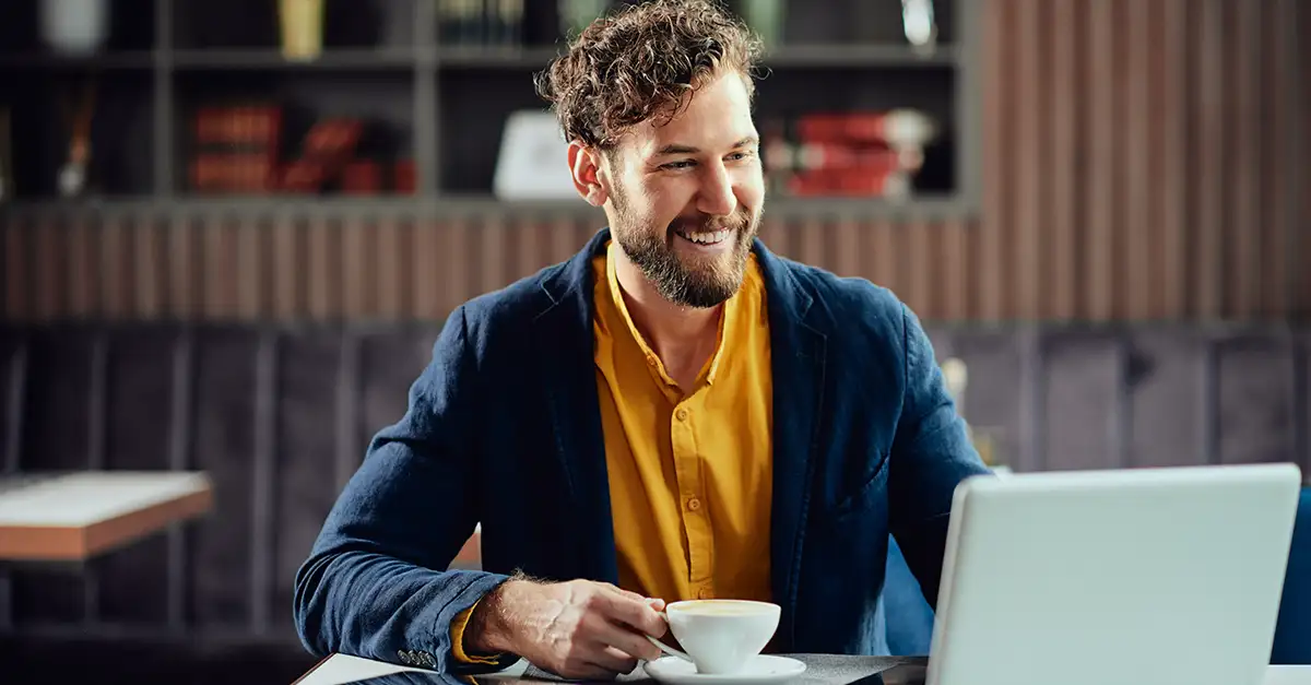 Cheerful professional at the cafe
