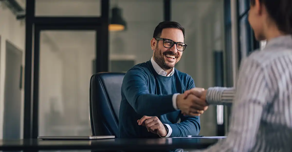 Handshake smiling