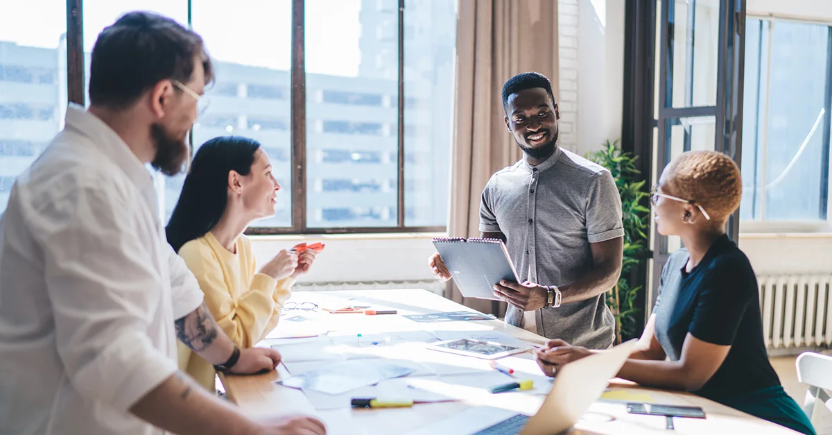 Business team collaborating during a meeting in a modern office conference room