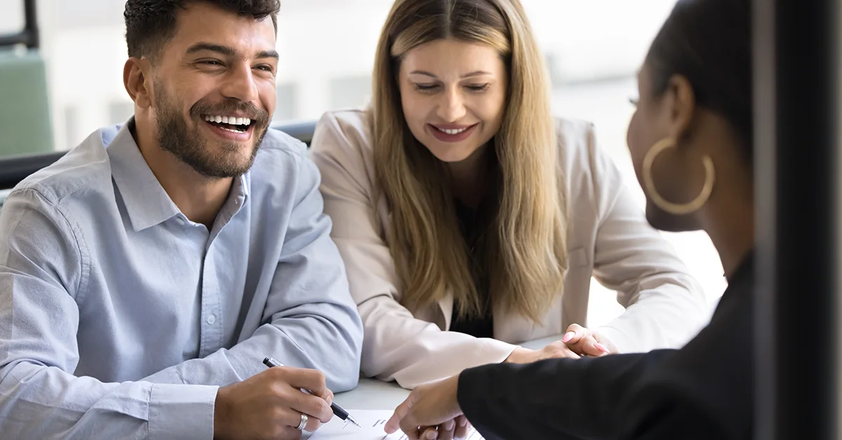 Business professionals collaborating during a team meeting in a modern office setting